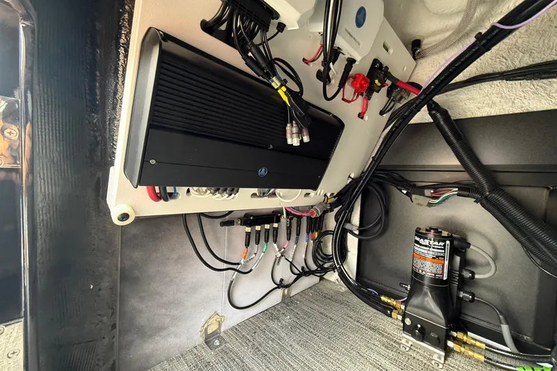 Slide: The Image of Electrical system components inside a 2026 Viaggio Lago Z22S-CC boat. - 28