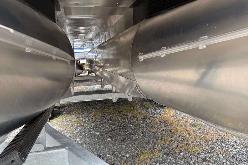 Slide: The Image of Underneath view of 2026 Viaggio Lago Z22S-CC pontoon boat, showcasing aluminum pontoons. - 33