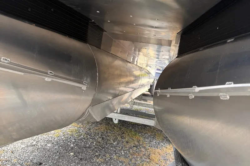 Slide: The Image of Underneath view of 2026 Viaggio Lago Z22S-CC pontoon boat, showcasing aluminum pontoons. - 34