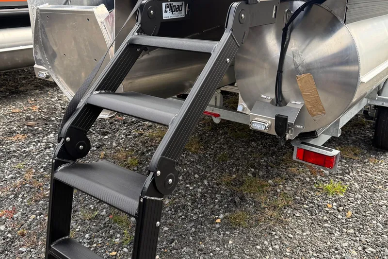 Slide: The Image of Rear view of 2026 Viaggio Lago Z22S-CC with foldable ladder on gravel. - 37