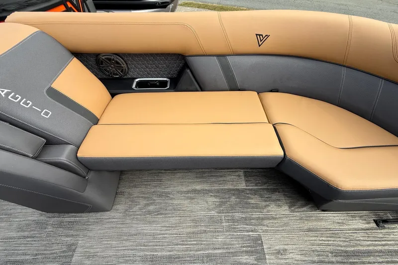 Slide: The Image of Luxurious seating in 2026 Viaggio Lago Z22S-CC boat, featuring tan and gray upholstery. - 5