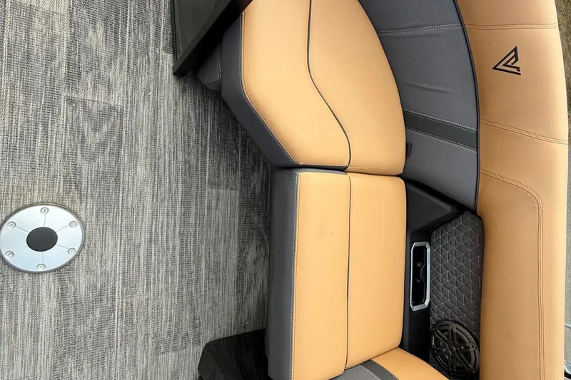 Slide: The Image of 2026 Viaggio Lago Z22S-CC boat interior with tan and gray seating. - 6