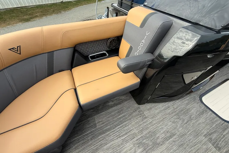 Slide: The Image of 2026 Viaggio Lago Z22S-CC boat interior with tan and gray seating, modern design. - 7