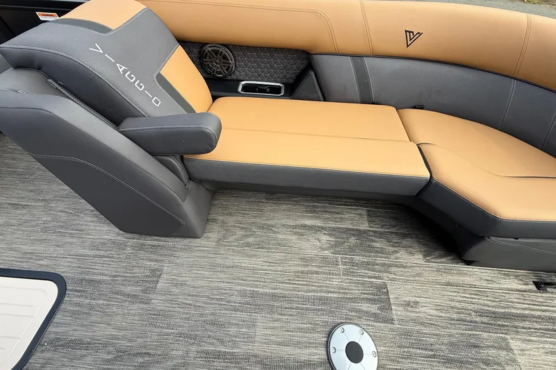 Slide: The Image of Luxurious seating in 2026 Viaggio Lago Z22S-CC boat, featuring tan and gray upholstery. - 8