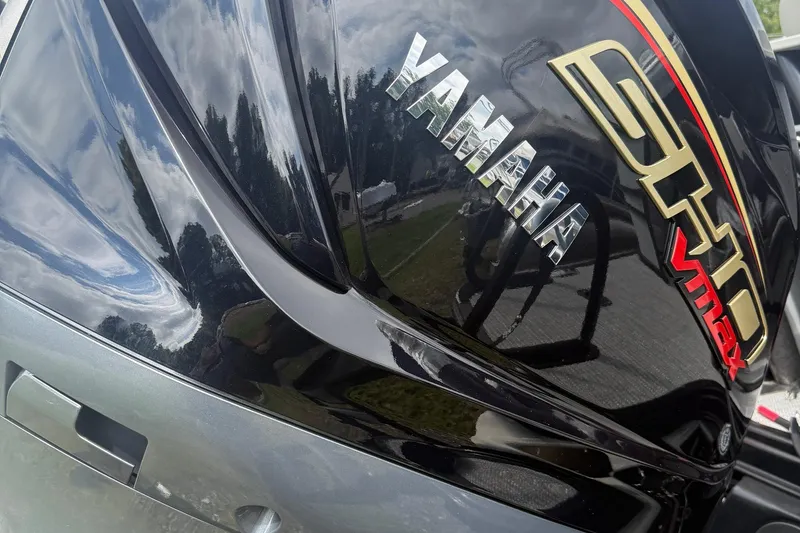Slide: The Image of Close-up of Yamaha SHO VMAX engine on 2026 SLYVAN X-3 Party Fish boat. - 24