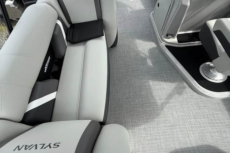 Slide: The Image of 2026 SLYVAN X-3 Party Fish boat interior with sleek gray seating and modern design. - 6