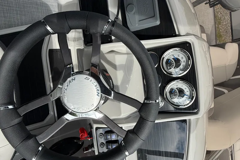 Slide: The Image of Steering wheel and dashboard of 2026 SLYVAN X-3 Party Fish boat. - 7