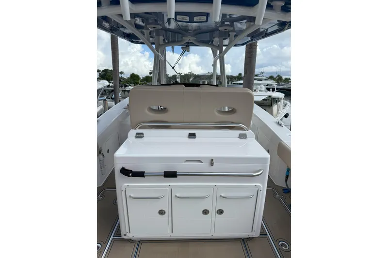 Slide: The Image of 2024 Southport 30 FE boat interior with seating and storage compartments. - 16