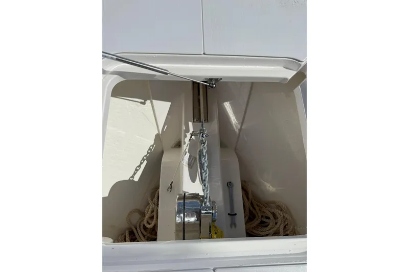 Slide: The Image of Anchor locker of 2024 Southport 30 FE boat with chain and rope storage. - 30