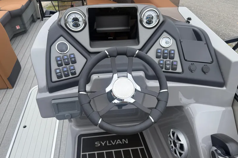 Slide: The Image of 2026 Sylvan L-3 DLZ DH boat dashboard with steering wheel and control panel. - 17