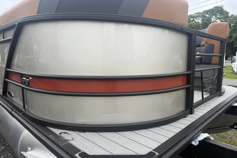 Slide: The Image of 2026 Sylvan L-3 DLZ DH pontoon boat with sleek design and comfortable seating. - 4