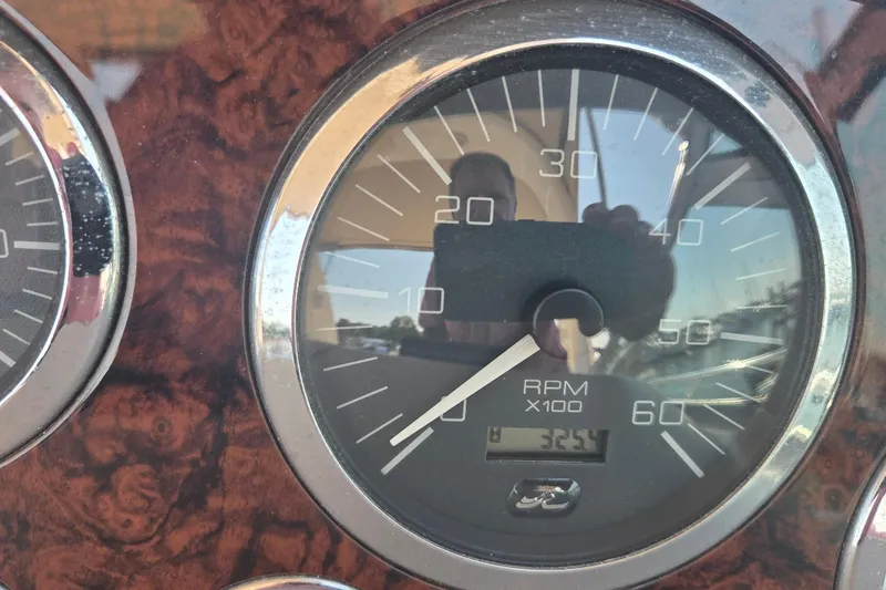 Slide: The Image of Close-up of 2003 Sea Ray 300 Sundancer RPM gauge, showing 3254 hours. - 33