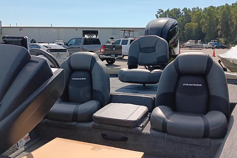 Slide: The Image of 2026 Tracker Pro Team 175 boat seats in a parking lot setting. - 11
