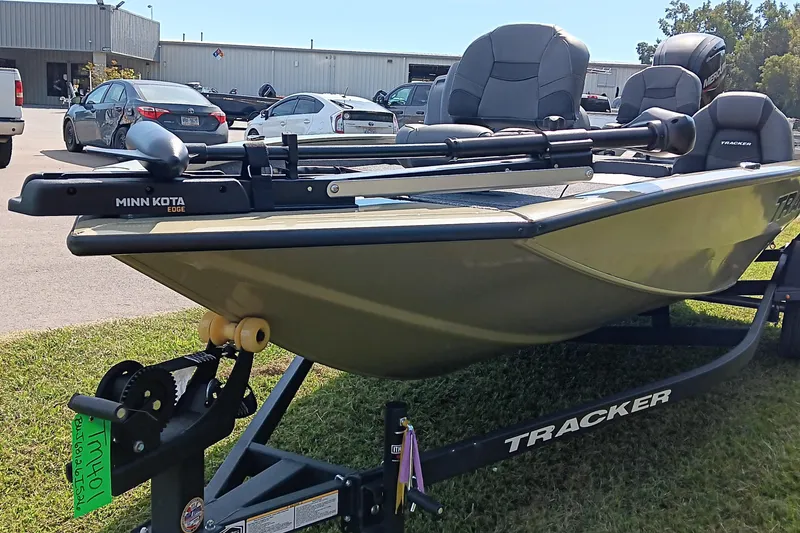 Slide: The Image of 2026 Tracker Pro Team 175 boat with Minn Kota Edge motor on trailer. - 8