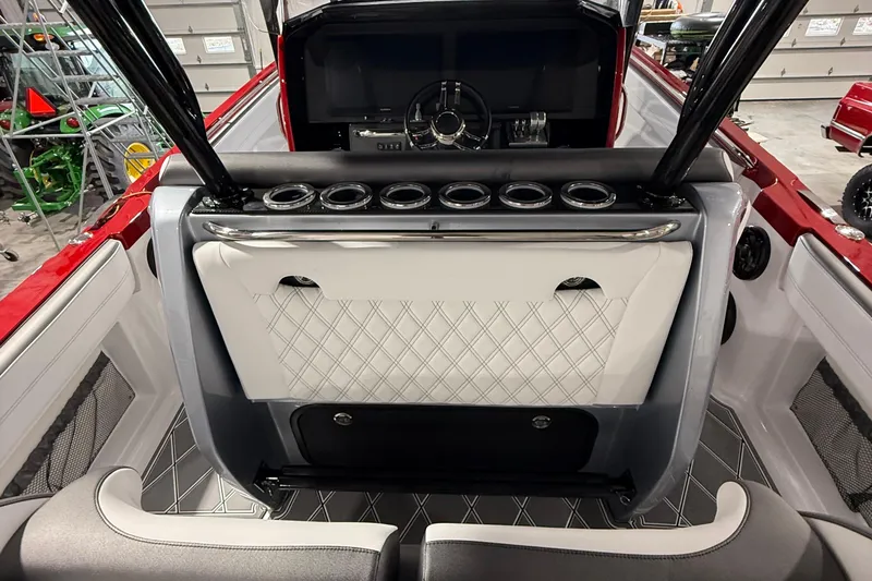 Slide: The Image of Interior of 2025 Nor-Tech 390 Sport boat, featuring sleek design and modern controls. - 23