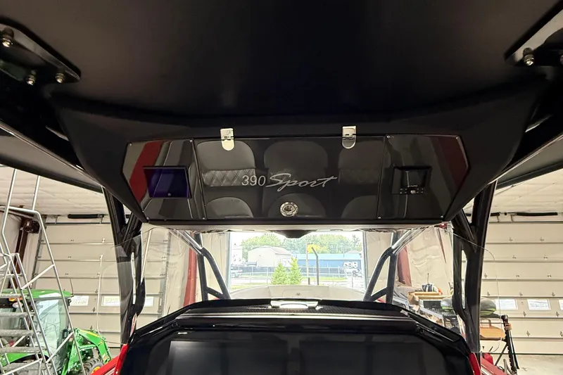 Slide: The Image of 2025 Nor-Tech 390 Sport boat interior with sleek design and modern features. - 25