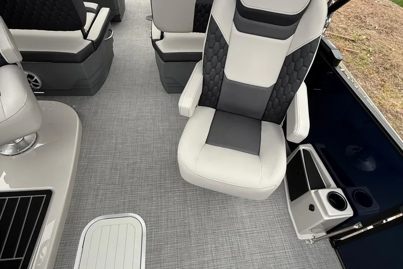 Slide: The Image of Luxurious interior of 2026 Sylvan L-3 RLZ DH boat with modern seating and flooring. - 11