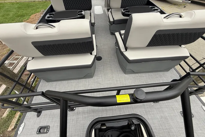 Slide: The Image of 2026 Sylvan L-3 RLZ DH boat interior with modern seating and sleek design. - 17
