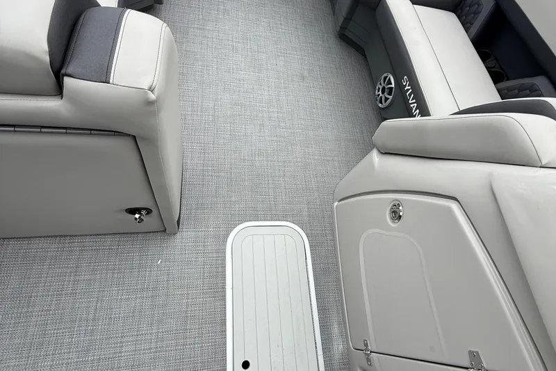 Slide: The Image of Interior of 2026 Sylvan L-3 RLZ DH boat with gray seating and flooring. - 25