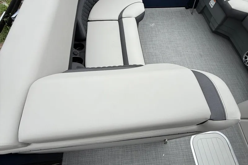 Slide: The Image of 2026 Sylvan L-3 RLZ DH boat interior with gray seating and cup holders. - 28