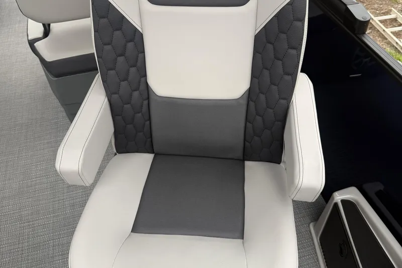 Slide: The Image of 2026 Sylvan L-3 RLZ DH boat seat with gray and white upholstery. - 29