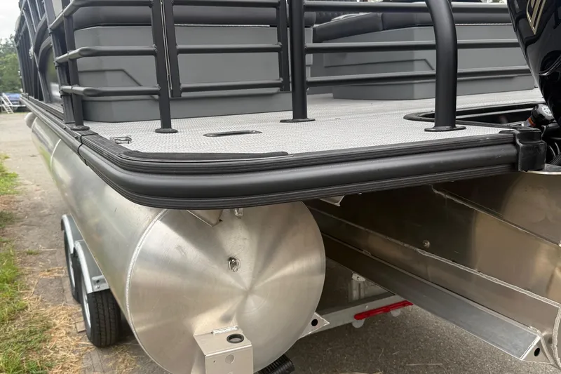 Slide: The Image of 2026 Sylvan L-3 RLZ DH pontoon boat, close-up of rear deck and pontoon tube. - 37