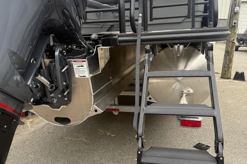 Slide: The Image of Rear view of 2026 Sylvan L-3 RLZ DH boat with motor and ladder. - 38