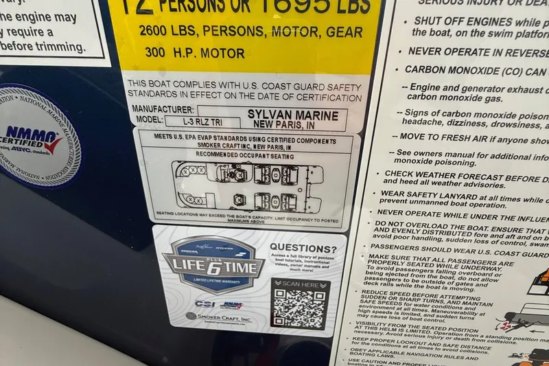 Slide: The Image of 2026 Sylvan L-3 RLZ DH boat safety labels, capacity details, and certification information. - 39