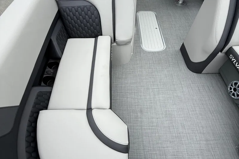 Slide: The Image of Luxurious interior of 2026 Sylvan L-3 RLZ DH boat with stylish seating and flooring. - 8