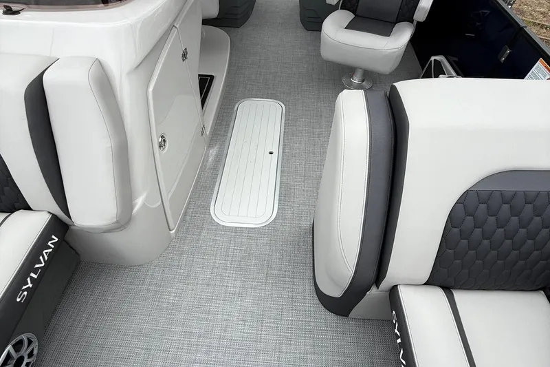 Slide: The Image of Interior of 2026 Sylvan L-3 RLZ DH boat with gray seating and flooring. - 9