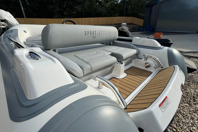 Slide: The Image of 2024 Williams Jet Tenders Sportjet 345, featuring sleek seating and modern design. - 5