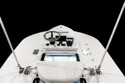 Slide: The Image of 2026 Contender 28 Tournament boat dashboard with steering wheel and controls. - 10