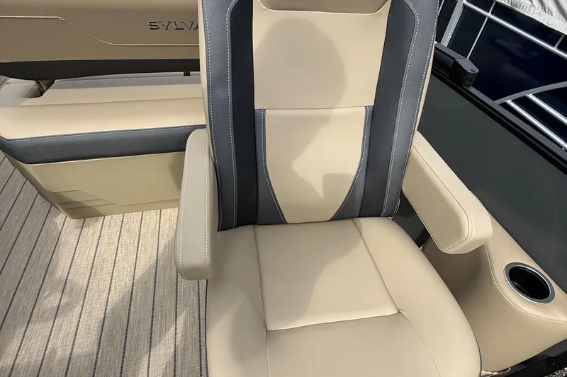Slide: The Image of Luxurious beige and gray seat on 2026 Sylvan X-1 CLZ DH boat. - 18