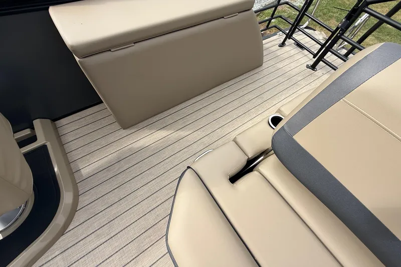 Slide: The Image of Luxurious interior of 2026 Sylvan X-1 CLZ DH boat with beige seating and flooring. - 20