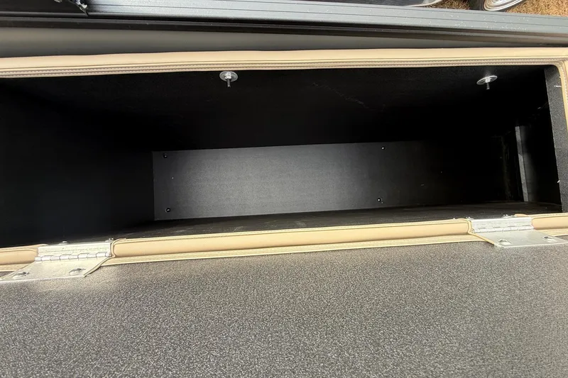 Slide: The Image of Spacious storage compartment in 2026 Sylvan X-1 CLZ DH boat, featuring durable interior design. - 21