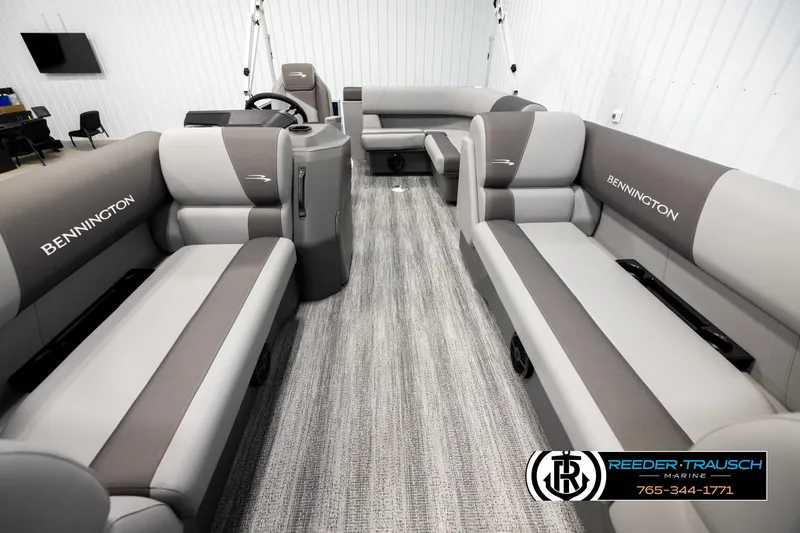 Slide: The Image of 2026 Bennington 188 SLJSE pontoon boat interior with gray seating and modern design. - 13
