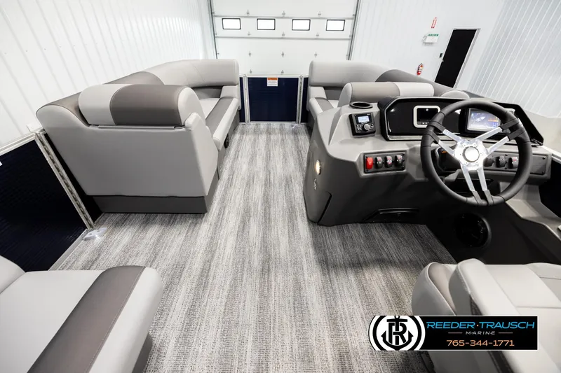 Slide: The Image of Interior of 2026 Bennington 188 SLJSE pontoon boat with modern seating and steering console. - 17