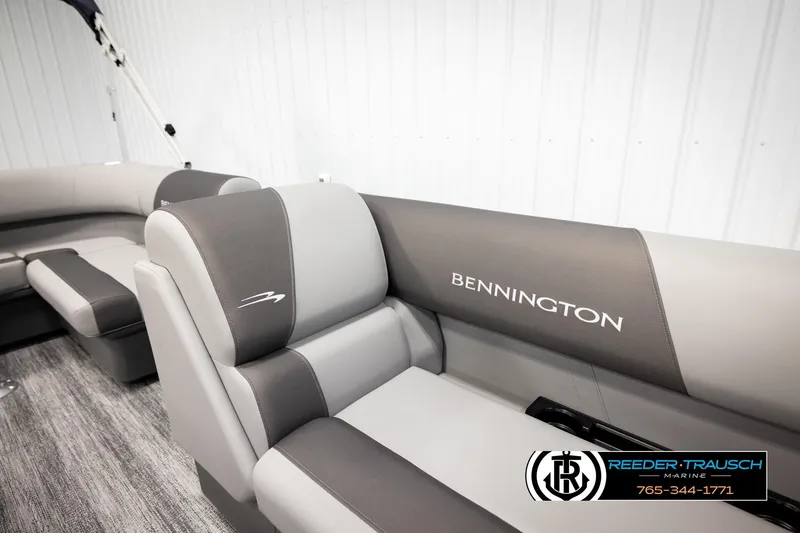 Slide: The Image of 2026 Bennington 188 SLJSE boat interior with gray seating and logo. - 20
