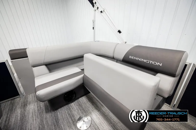 Slide: The Image of 2026 Bennington 188 SLJSE boat interior with gray seating and logo. - 25