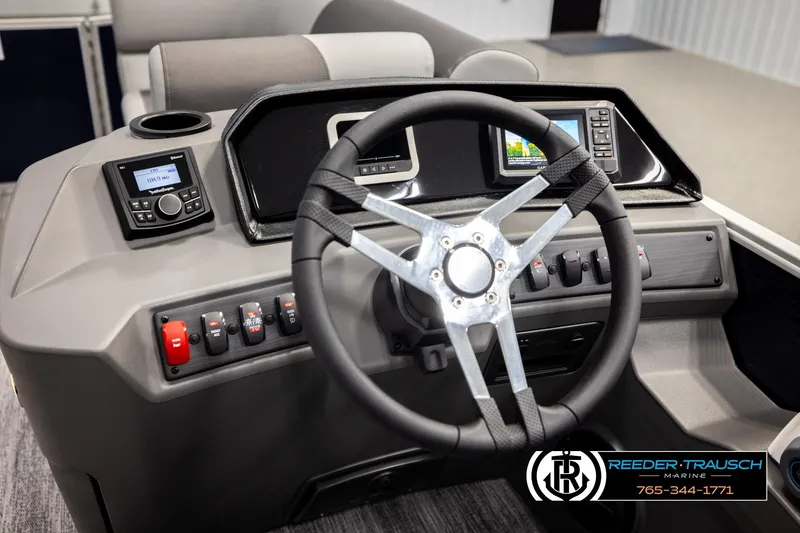 Slide: The Image of Steering console of 2026 Bennington 188 SLJSE boat with modern controls and displays. - 27