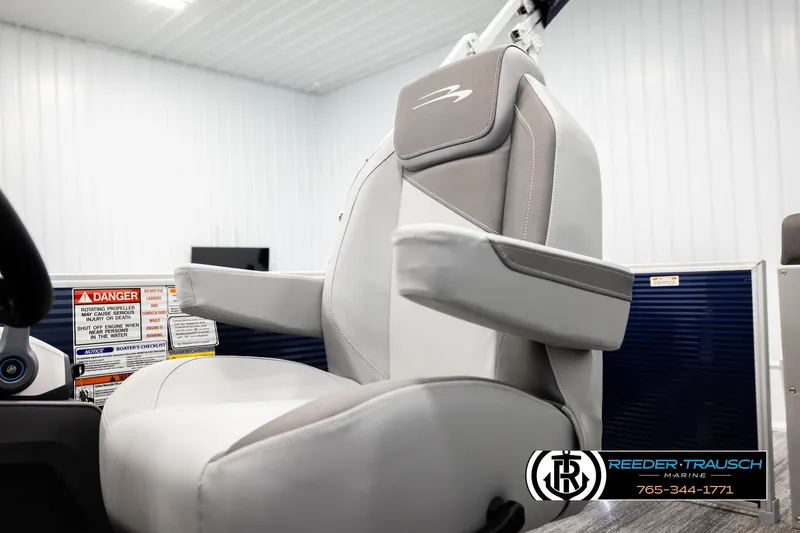 Slide: The Image of Captain's chair in 2026 Bennington 188 SLJSE boat, featuring sleek design and safety warnings. - 36