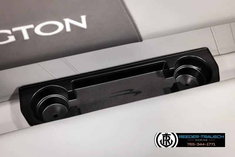 Slide: The Image of 2026 Bennington 188 SLJSE boat interior with cup holders and Reeder-Trausch Marine logo. - 40