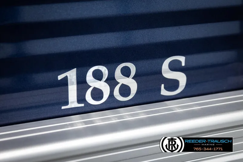 Slide: The Image of Close-up of 2026 Bennington 188 SLJSE boat model number on blue surface. - 44