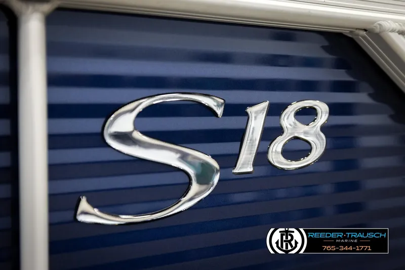 Slide: The Image of Close-up of 2026 Bennington 188 SLJSE boat emblem with S18 marking. - 47