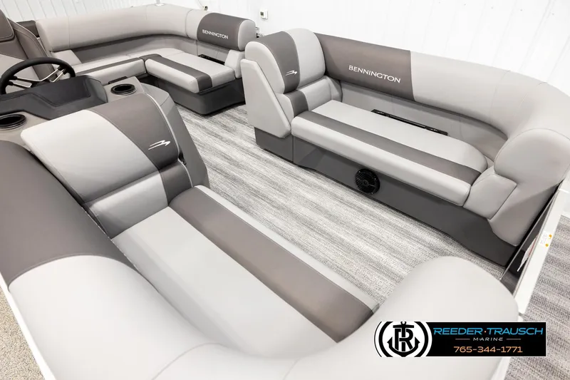 Slide: The Image of 2026 Bennington 188 SLJSE pontoon boat interior with gray seating and steering wheel. - 9