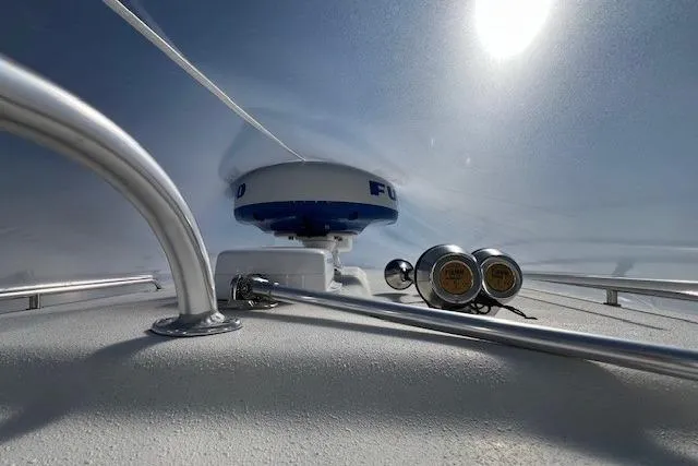 Slide: The Image of 2023 Parker 2820 XLD Sport Cabin boat radar and horn on deck. - 22