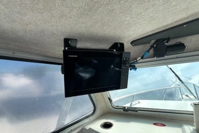 Slide: The Image of 2023 Parker 2820 XLD Sport Cabin interior with mounted screen and window view. - 29