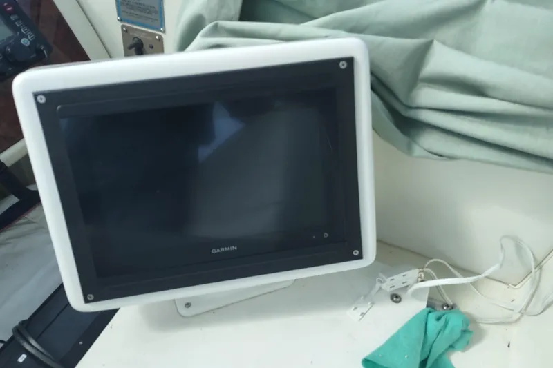 Slide: The Image of Garmin marine display on 2001 Maxum 4600 SCB yacht dashboard. - 15