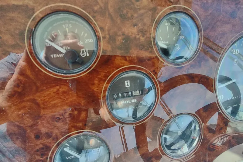 Slide: The Image of Close-up of 2001 Maxum 4600 SCB boat dashboard gauges and controls. - 16