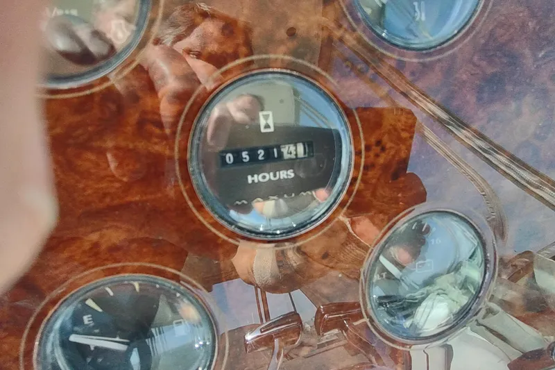 Slide: The Image of Close-up of Maxum 4600 SCB 2001 boat dashboard showing 521 hours. - 17